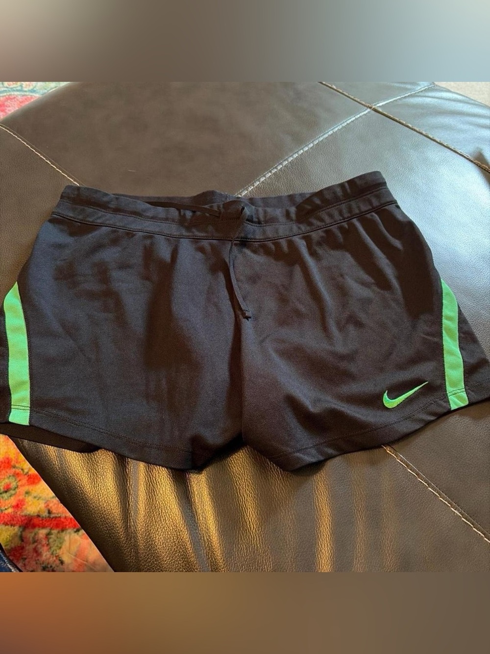 Nike Women's Black Athletic Shorts with Green Trim